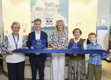 N&N Hospitals Charity Director Rachel Backshall, Consultant Surgeon James Hernon, Politics East and Look East Presenter Amelia Reynolds, Group CEO Prof Lesley Dwyer and Theo Bilham, winner of our draw the robot competition.